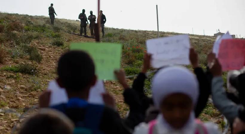 barbed wire school protest Palestine