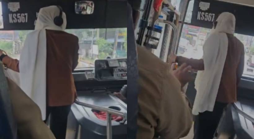 woman smashed side glass of KSRTC bus